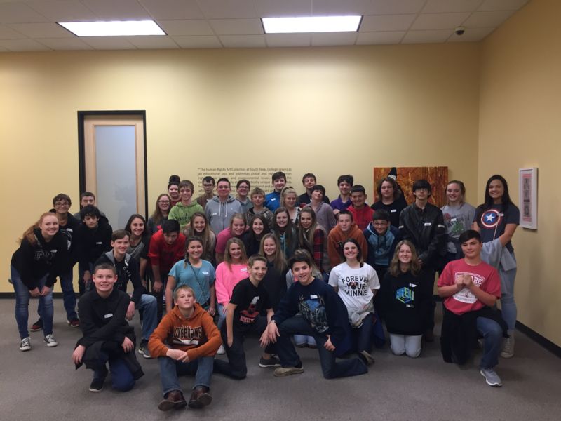 Deweyville 8th Grade class poses at the Houston Holocaust Museum 